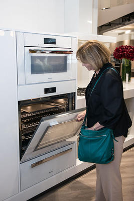 A guest looking at the appliances