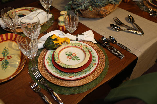 Tabletop styled by Julie Schuster in brilliant shades of burnt reds, mustard yellows and sage greens to replicate a Tuscan garden party