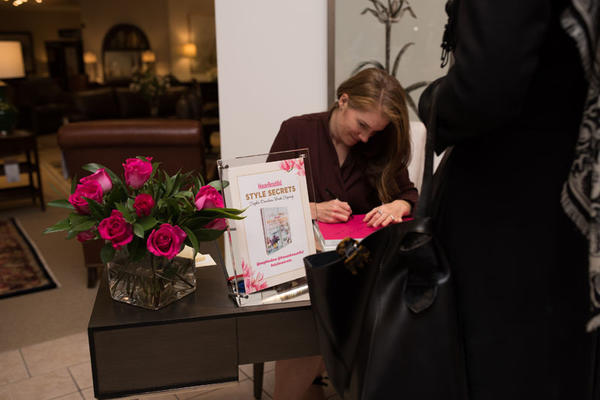 Sophie Donelson signing books for guests