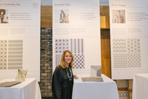 Suzanne Tick in front of her tile design