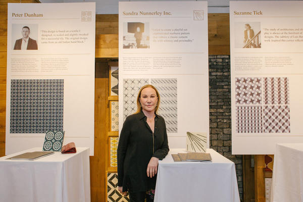Sandra Nunnerley in front of her tile design