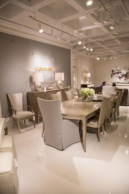 Caracole’s Silver Platter dining table and dining chairs
