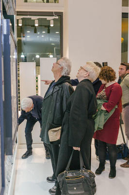 Guests view the tile collection. 