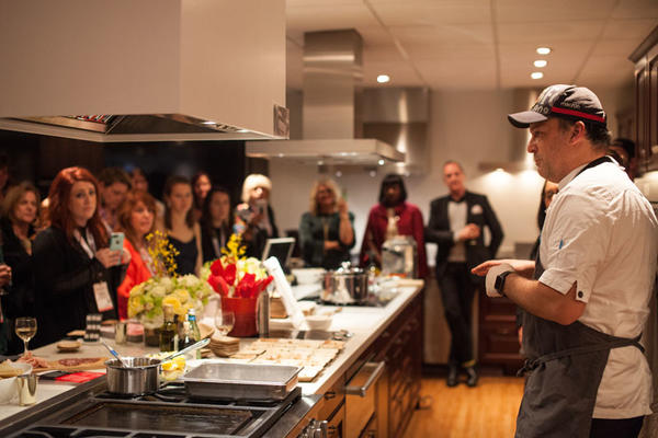 Chef Steve Samson sharing tips before his cooking demonstration begins