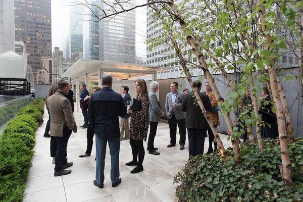 Guests mingle on the Philip Johnson Terrace.