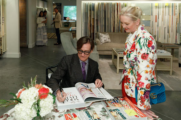 Hamish Bowles signs his latest book, ‘Vogue Living: Country, City, Coast’ for designer Danielle Rollins.