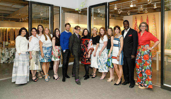 Hamish Bowles poses with Schumacher president Benni Frowein and creative director Dara Caponigro and the Atlanta Showroom team, whose skirts (and one bow tie) were handmade from materials at Schumacher.