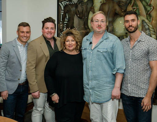 R Hughes showroom owner Ryan Hughes, designers Jonathan Savage and Susan Ferrier, moderator Robert Leleux, and showroom co-owner Stephen Leonard gather at R Hughes following their insightful showhouse panel.
