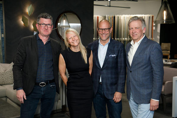 Designers Patrick Sutton and Elizabeth Ingram; chef, television personality, and moderator Alton Brown; and architect Steven Rugo enjoy a reception at the Paul+ showroom following their ‘Take Out: Bring Restaurant Design Home’ panel discussion.