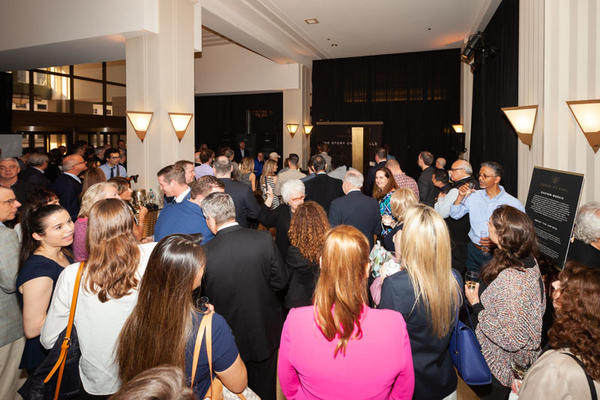 More than 150 industry professionals attended the grand opening.