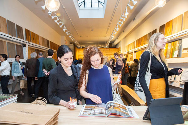 Karin Honarvar and Natalie LaBossier flip through Clodagh's book, ‘Clodagh: Life-Enhancing Design.’