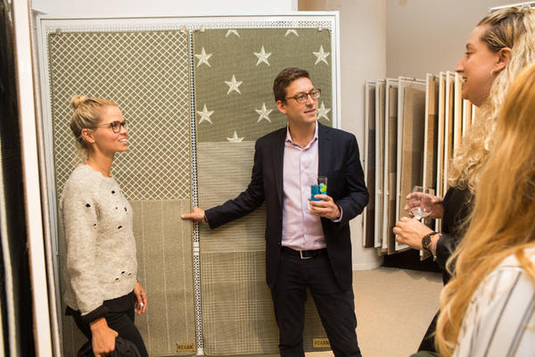 Chad Stark shows off samples in the newly reimagined trade showroom.