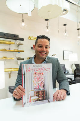Mario López-Cordero smiles with his latest tome, Veranda 