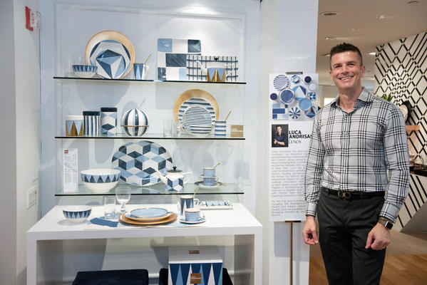 Luca Andrisani next to his award-winning collection Blue Azzurro