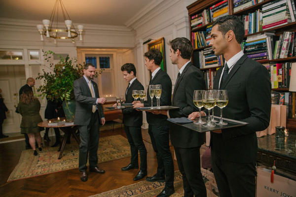 Guests are greeted with cocktails and passed hors d’oeuvres.