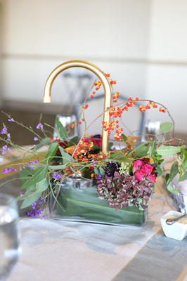 Custom centerpieces featured Rohl hardware.