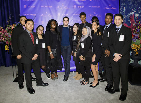 The evening's honorary chair Zac Posen with East Side House Students