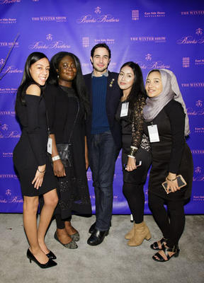 The evening's honorary chair Zac Posen with East Side House Students