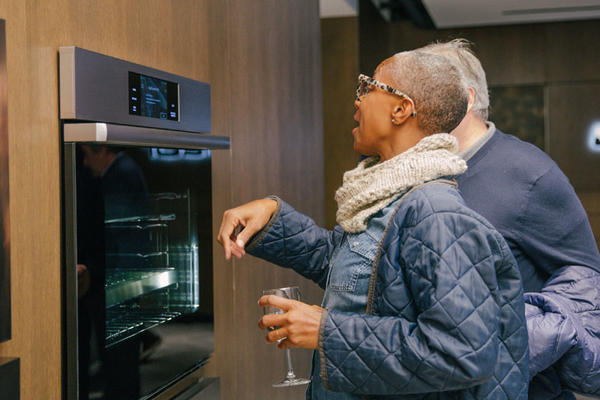 Guests explore the Dacor appliances