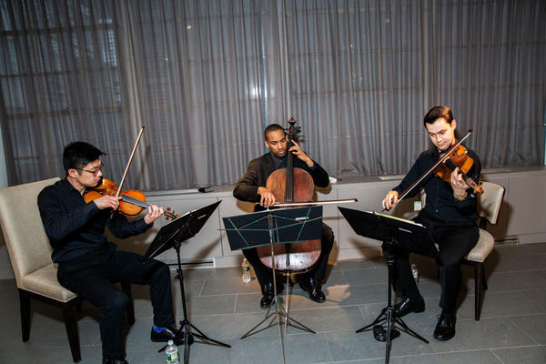 A Julliard trio entertained guests