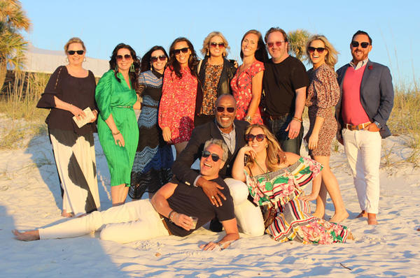 (Back row, from left) Linda Burnside, Kristin Kong, Traci Zeller, Jenny Slingerland, Lexi Westergard, Laura LaFrenais, Patrick Madden, Britany Simon and Ray Langhammer. (Front row, from left) Thom Filicia, Ron Woodson and Jaime Rummerfield
