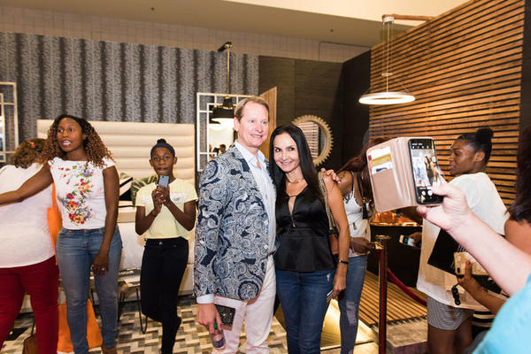 Say cheese! Carson Kressley poses for a photo with a Home Show guest.