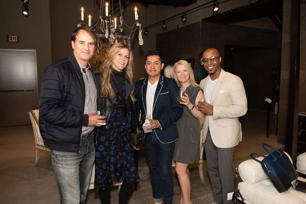 Designers including Kati Curtis (second from left) and Corey Damon Jenkins (far right) were on hand to celebrate the showroom's opening.
