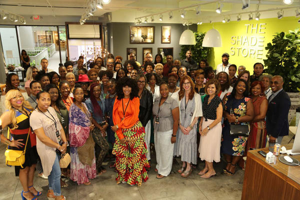 'Cheese!' Attendees of Thursday's luncheon at The Shade Store pose for a group photo.
