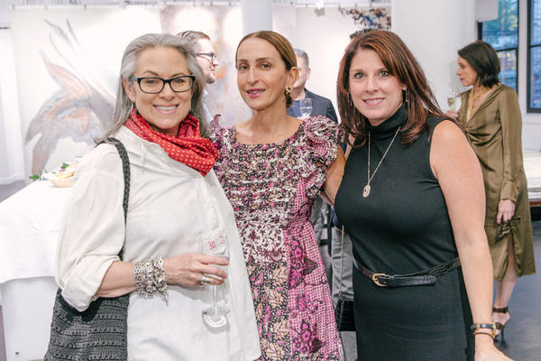 Pam Sommers, director of public relations at Rizzoli (left), and her associate Jessica Napp flank New York–based publicist Christina Juarez.