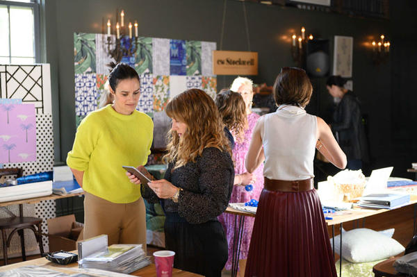 Sara Ruffin Costello shopping Paige Cleveland’s collection of marbelized silks, leather and wallpaper