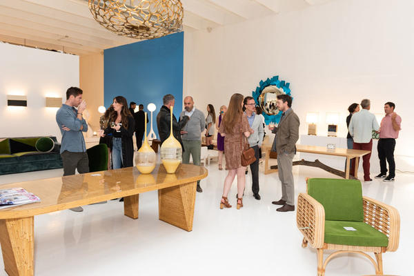Guests mingled amongst the exhibitions inside the gallery.