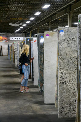Guests perused the many stone options on display in the Nash Stone showroom.
