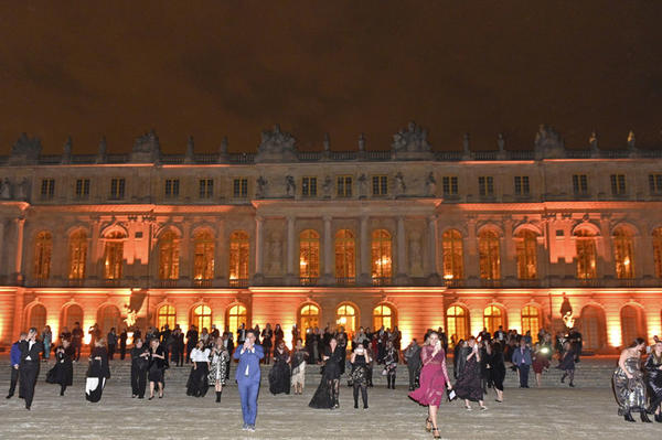 Guests entered the Gardens of Versailles to view the surprise fireworks display.