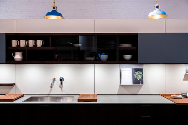 Mac pendants from The Urban Electric Co. hang over a Henrybuilt kitchen.