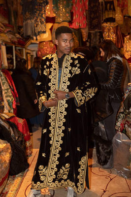 ASID NY Metro Chapter emerging professionals chair Keith Jones looking regal as he shops for a kaftan