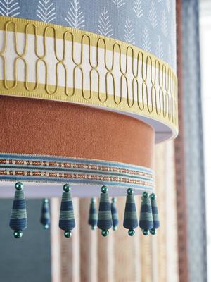 Hope Mill fabric in Loden, Azizi trim in Honey trim, Bohemian Velvet in Burnt Sienna, and Lintong trim in Teal Frost