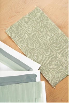 Linear Cloud fabric in Sage is a perfect way to bring some nature into your home