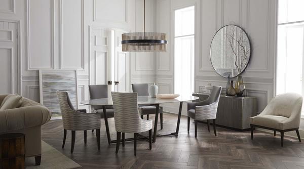 Ada Dining Chairs around the Modern Oval Dining Table