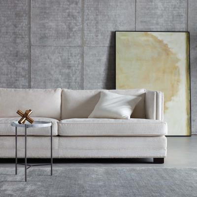 The Keaton Shelter Arm Sofa with a Seville Pull-up Table