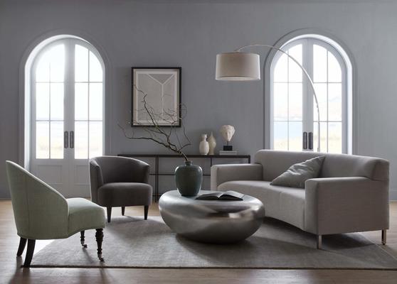 The Costello Chair with a Riverstone Cocktail Table, Marcello Sofa and Mae Chair