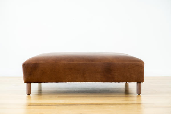 Hawthorne Ottoman in Tobacco leather and walnut