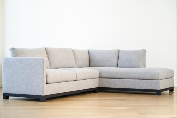 Mapleton Bumper Sectional in Gray linen and Charcoal oak