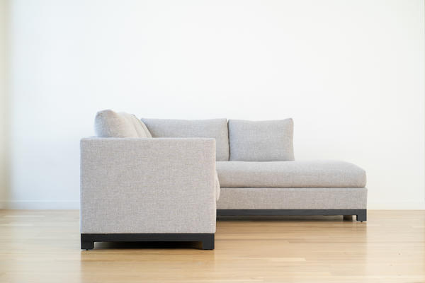 Mapleton Bumper Sectional in Gray linen and Charcoal oak