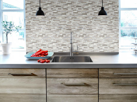 Feature is an easy-to-install groutless stone mosaic with a unique three-dimensional texture.