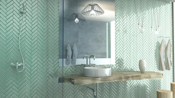 Irish is a large-scale, fashion-forward glass mosaic in a herringbone pattern with a glossy finish.
