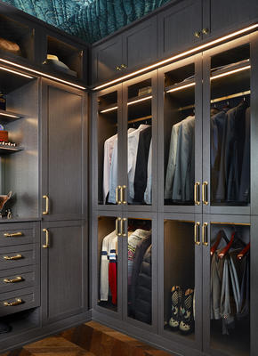 Laren Walk-in Closet in Hazelnut with LED lighting and glass doors 

Design by Doniphan Moore Interiors; photography by Lisa Petrole