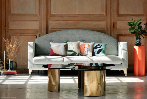 The most contemporary piece in the collection, the Hébé coffee table was designed as a trio, with one large model and two small ones so that each owner may invent a unique and suitable composition. Visually striking with a brushed finish on brass bases, the set features smoked glass tabletops, creating a striking contrast of materials and inspiring long evenings spent with friends. 