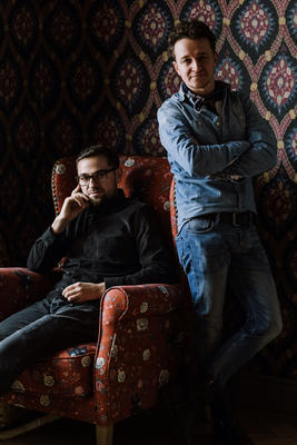 Stefan Ormensian, MindTheGap's co-founder and creative manager (standing), and Victor Serban, the company's co-founder and managing partner (seated).