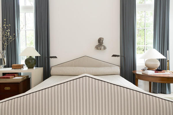 The primary bedroom, designed by Nashville’s Jason Arnold Interiors