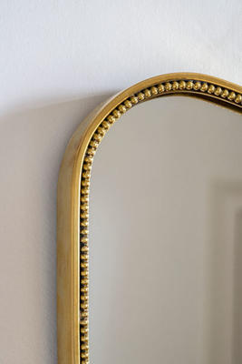 Detail of the Bexley mirror in Brass